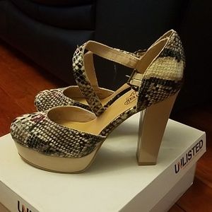 Snakeskin Platform Heels.